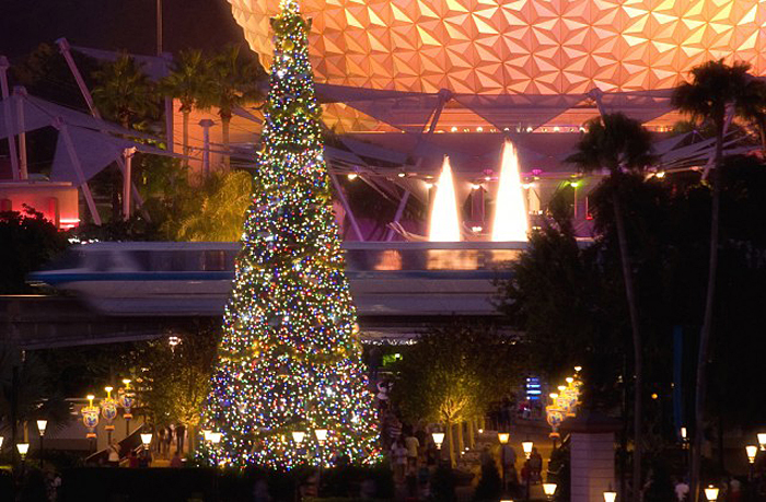 The giant Christmas tree at Epcot, seen here glistening in front of the iconic Spaceship Earth attraction, is the centerpiece of the holiday celebration at the theme park in Lake Buena Vista, Fla. It's all part of the park's annual "Holidays Around the World" celebration, in which international traditions of the season unfold all throughout World Showcase. Epcot is one of four theme parks at Walt Disney World Resort. (Garth Vaughan, photographer) 