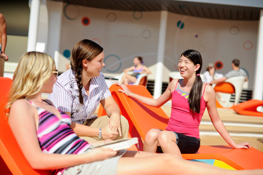 Girls on sun-chairs at Disney Cruise