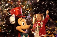 CELEBRATE THE SEASON -- Mickey Mouse presides over the holiday festivities during Mickey's Very Merry Christmas Party at Magic Kingdom in Lake Buena Vista, Fla. The annual nighttime event features exclusive entertainment such as "Mickey's Very Merry Christmas Parade" and a special edition of the Disney fireworks spectacular "Wishes," as well as snow falling on Main Street, U.S.A. Mickey's Very Merry Christmas Party is held on select nights in December each year at Magic Kingdom, one of four theme parks at Walt Disney World Resort.